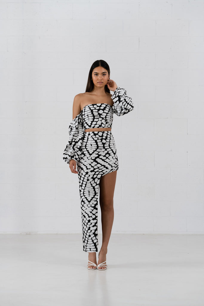 The Peyton Top is a structural bodice crop with with detachable ruffle sleeves. Designed in a textured abstract black and white pattern fabric.