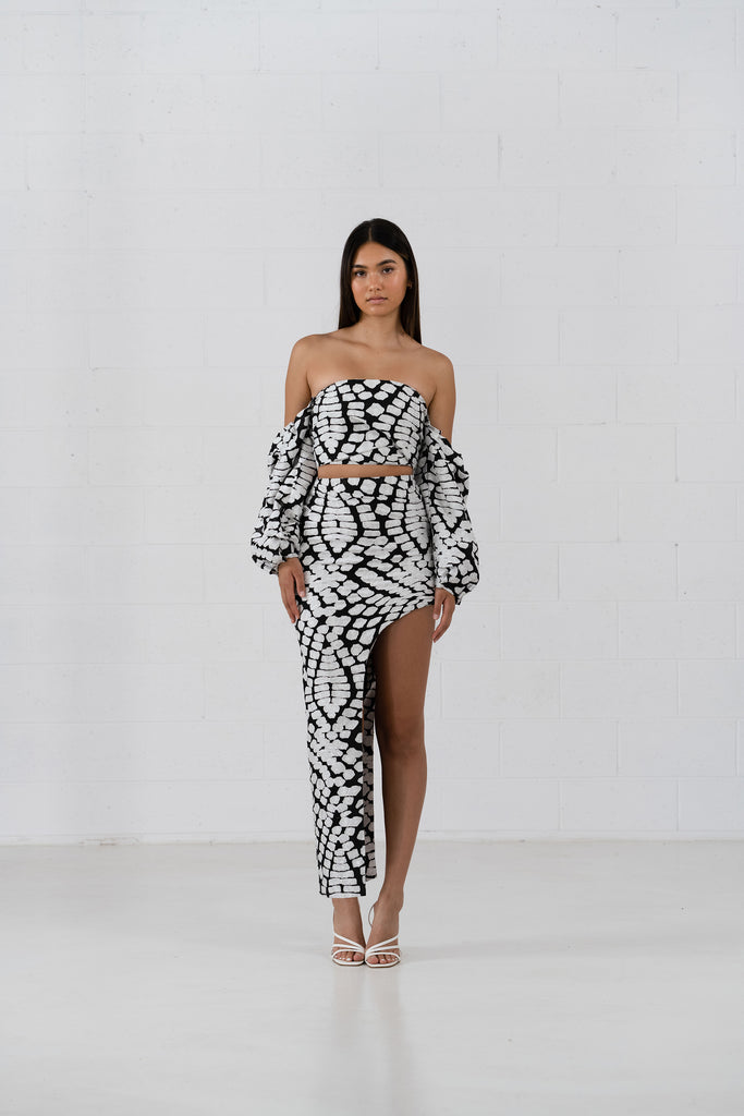 The Peyton Top is a structural bodice crop with with detachable ruffle sleeves. Designed in a textured abstract black and white pattern fabric.